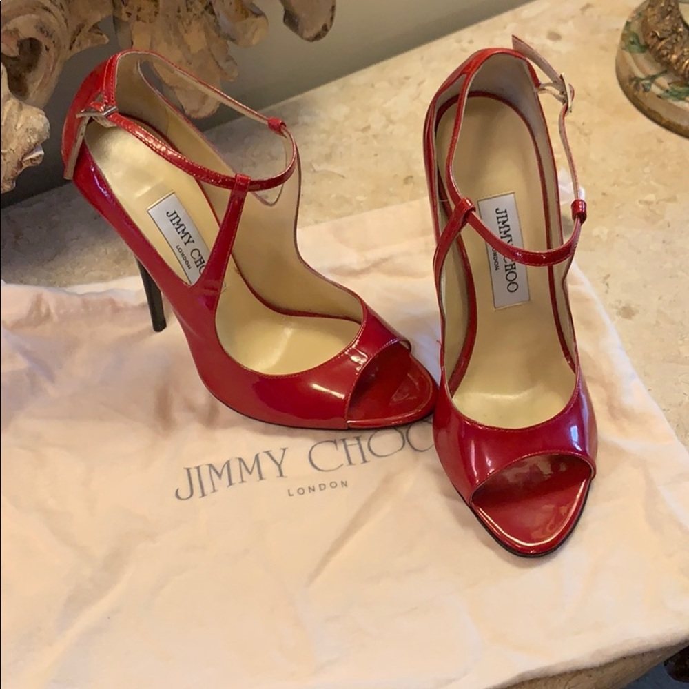 Gorgeous Jimmy Choo patent ankle strap pumps.